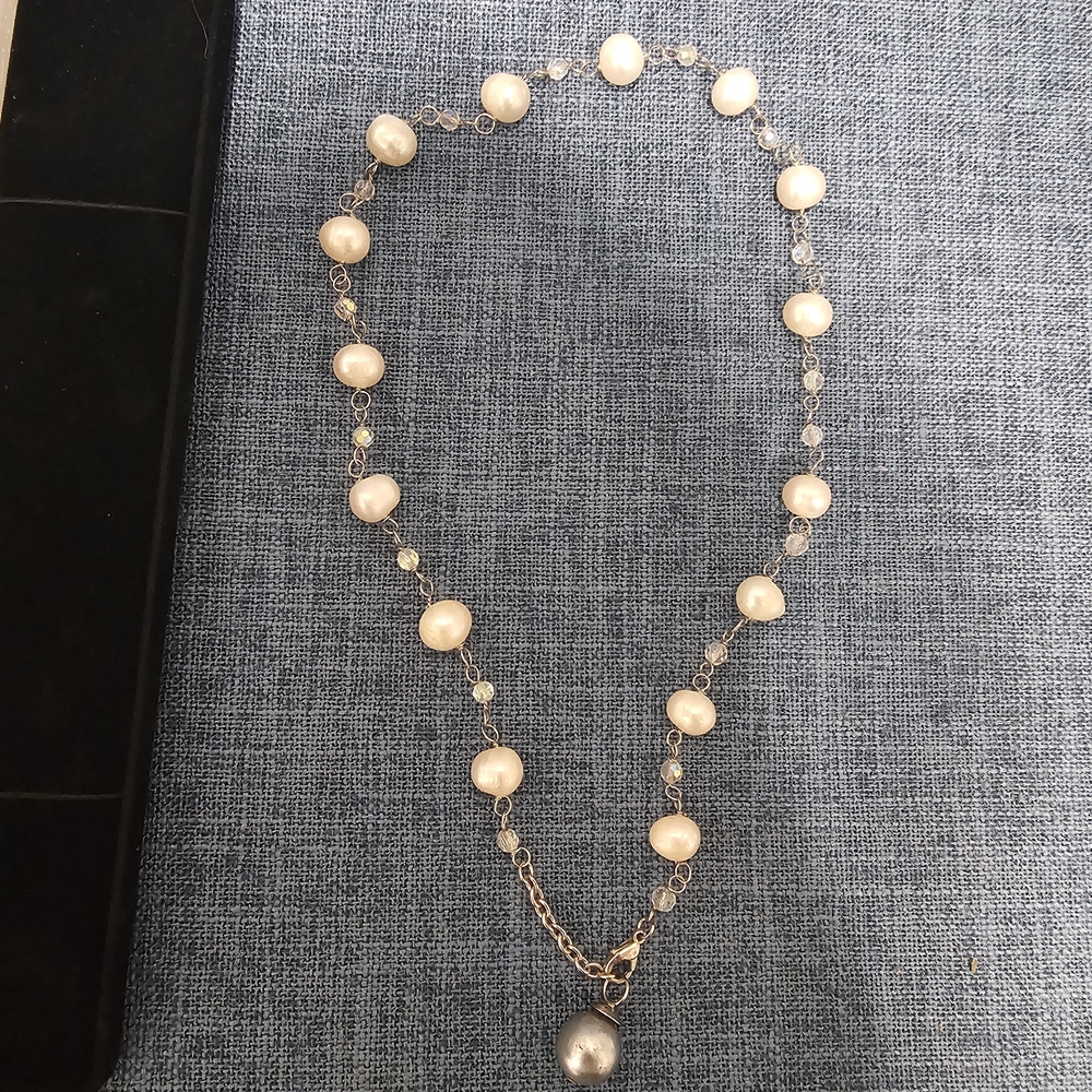 Genuine pearl necklace on a silver base, 0.26cm, 11 inches.